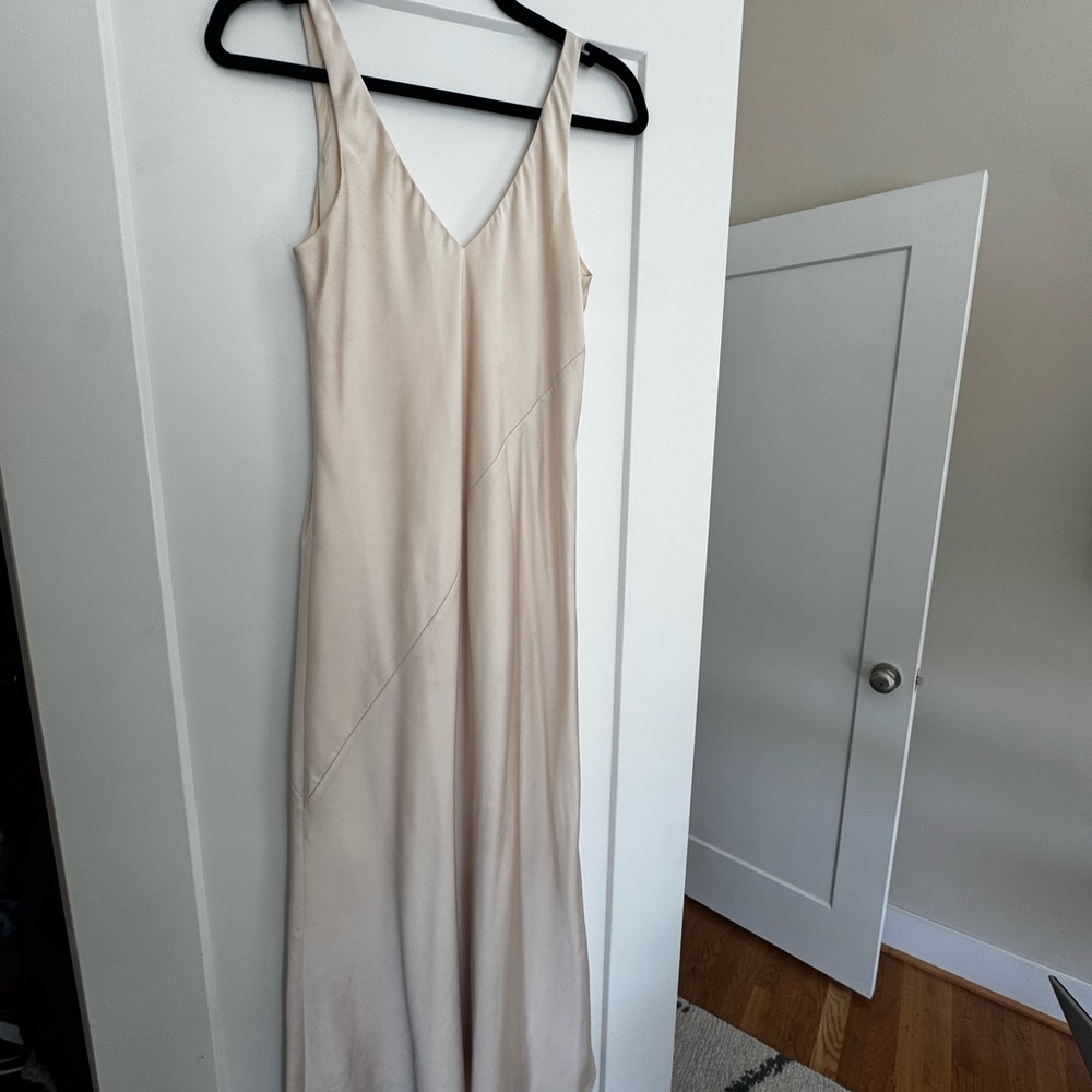 Elegant Silk Cream Sleeveless Dress